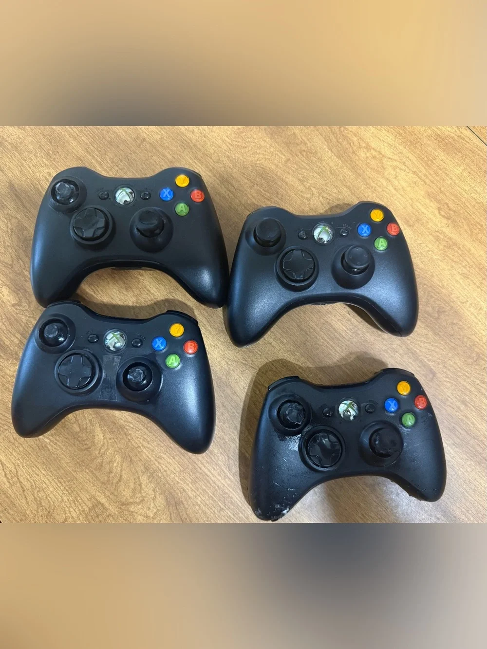 Xbox 360 wireless controllers set of 4 *FOR PARTS ONLY* *1 is still in GUC*